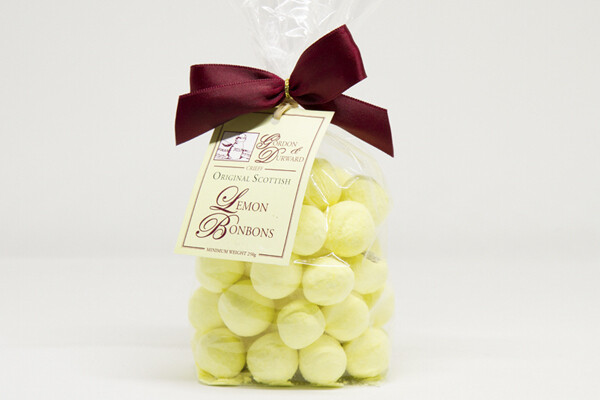 250g Bag of Lemon Bonbons, tied with a gift red ribbon.